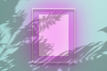 Mockup poster in a neon frame with a pink glow. Scene with tropical overlay palm shadows with free space inside