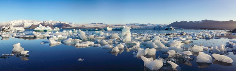 Beautifull landscape with floating icebergs in Jokulsarlon glacier lagoon at sunset
