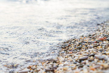 Sea stones on the seashore in the summer