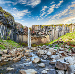 Amazing view of Svartifoss waterfall with basalt columns on South Iceland.