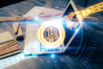 Double exposure of blockchain and crypto economy theme hologram and table with computer background....