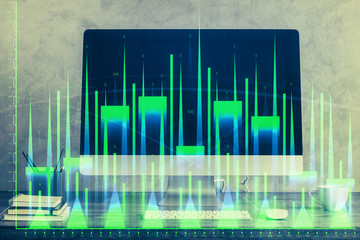 Financial market graph hologram and personal computer on background. Double exposure. Concept of forex.