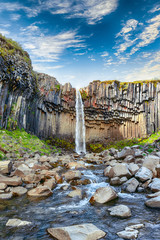 Amazing view of Svartifoss waterfall with basalt columns on South Iceland.