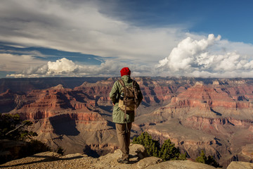 Fototapeta premium A hiker in the Grand Canyon National Park, South Rim, Arizona, USA.