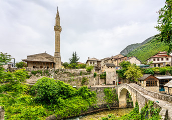 Nezir Agina Mosque and Crooked bridge in Mostar, Bosnia and Herzegovina