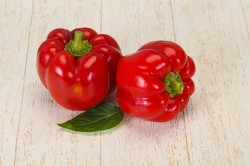 Ripe Red bell pepper over wooden