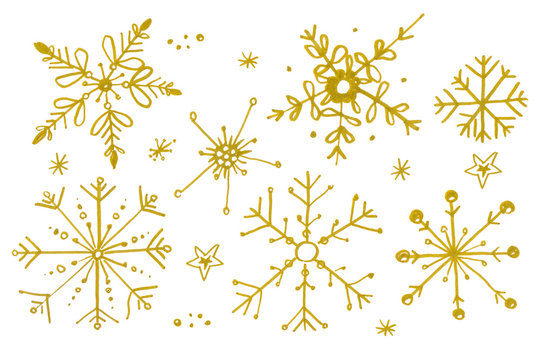 Set of gold watercolor snowflakes isolated on white background.