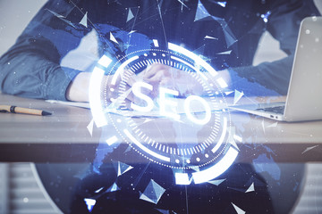 Man writing. With double exposure seo drawings.