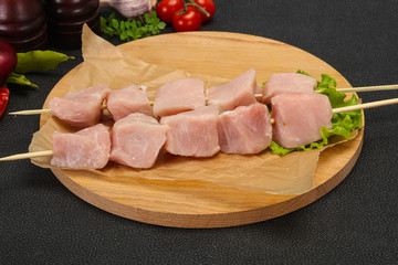 Raw pork meat skewer for grill