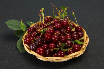 Sweet ripe cherry with leaves