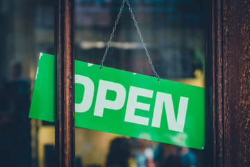 open sign in shop window - open sign in store entrance -