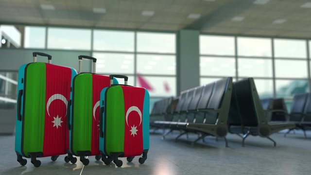 Travel suitcases with flag of Azerbaijan. Azerbaijani tourism conceptual 3D animation