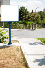 advertising board on asphalt road