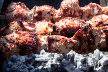 Meat fried on open fire. Barbeque close up