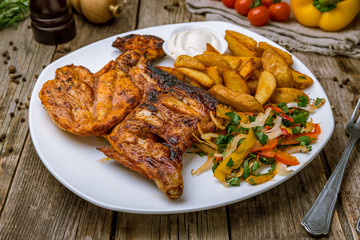 fried chicken tobacco with potatoes. Turkish cuisine