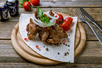 Rack of lamb on old wooden table