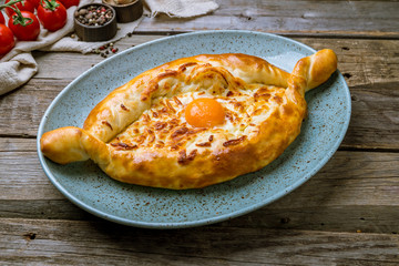 ajara Khachapuri georgian kitchen on old wooden table