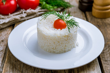boiled rice on wooden table