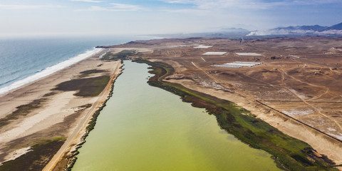 Panoramic aerial view of a wetland sited at north of Lima called "Albufera de Medio Mundo" near to Huacho city, Lima region, Peru