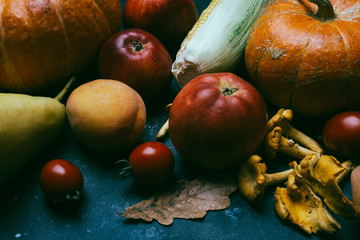 Autumn seasonal vegetables and fruits (pumpkin, pear, apples, corn, chanterelles). Autumn products from the farm, or garden.
