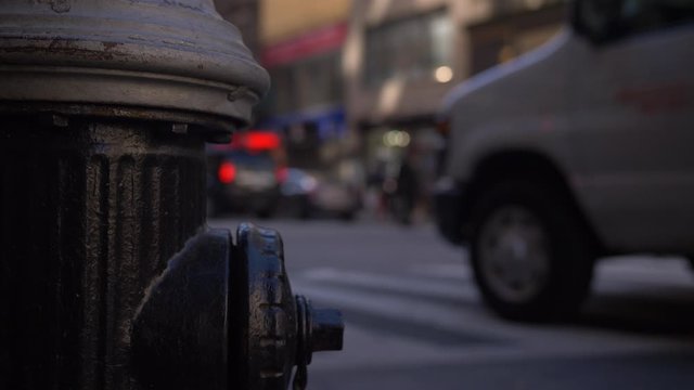 Close Up Of Black American Fire Hydrant On An Iconic New York City Street As Classic Traffic