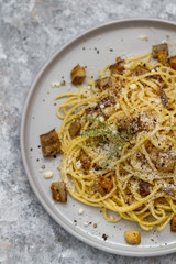 Spaghetti with eggplants, parmesan, thyme and pepper. Pasta with eggplants.