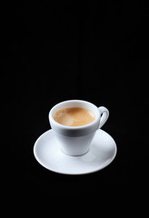 Cup of espresso on black background. 