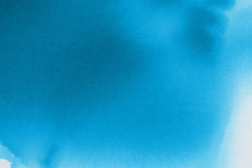 Hand painted blue alcohol ink background. Abstract delicate winter season texture. Contemporary wallpaper. 