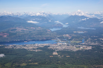 Obraz premium Aerial view of a small town, Port Alberni, on Vancouver Island during a sunny summer morning. Located in British Columbia, Canada.