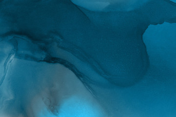 Hand painted blue alcohol ink background. Abstract delicate winter season texture. Contemporary wallpaper. 