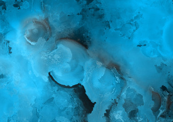 Fototapeta premium Hand painted blue alcohol ink background. Abstract delicate winter season texture. Contemporary wallpaper. 