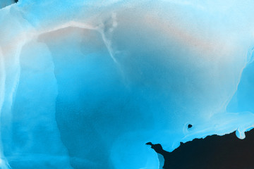 Fototapeta premium Hand painted blue alcohol ink background. Abstract delicate winter season texture. Contemporary wallpaper. 