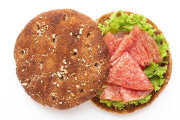 Sandwich with ham sausage on white background.