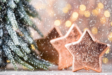 Christmas bronze decoration. Holiday decorations bronze on bokeh background.