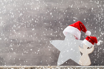 Christmas stars santa hat. Christmas pattern. Background on the gray color.