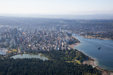 Aerial View of a Modern Downtown City during a sunny summer day. Taken in Vancouver, British Columbia, Canada.