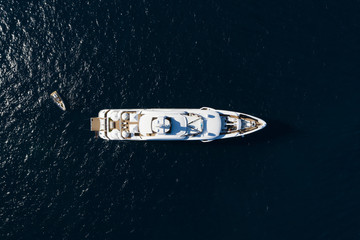 View from above, stunning aerial view of a luxury yacht sailing on a blue sea. Emerald Coast (Costa...