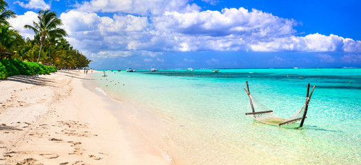  Mauritius island holidays. Beautiful beach scene with hammock