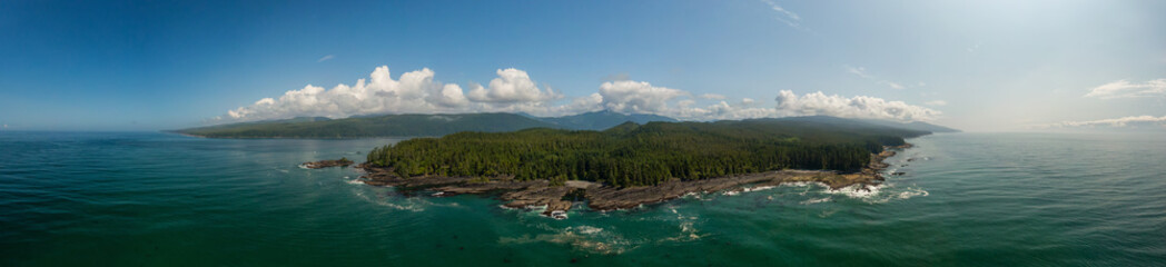 Fototapeta na wymiar Beautiful Aerial Panoramic Landscape View of the Rocky Pacific Ocean Coast in the Southern Vancouver Island during a sunny summer day. Taken between Victorial and Port Renfrew, BC, Canada.