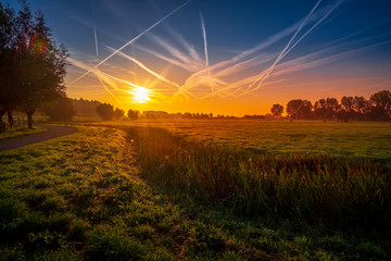 Fototapeta na wymiar Beautiful countryside sunrise in Netherlands