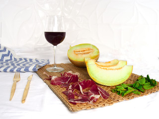 Healthy aperitif of melon with liberian ham. Healthy food concept