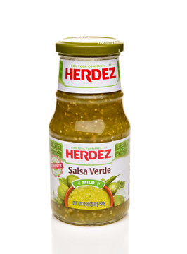 IRVINE, CALFORNIA - FEBRUARY 17, 2019:  A 16 ounce jar of Herdez Salsa Verde. herdez in one of the top slasa brands oin Mexico.