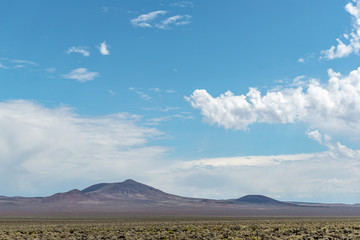 The boundary of the Nellis Air Force Range Nevada Test Site near Area 51 unnamed volcanic buttes ...