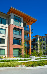 Brand new apartment building on sunny day in British Columbia, Canada.