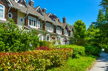 Residential townhouses on sunny day in Vancouver, British Columbia, Canada.