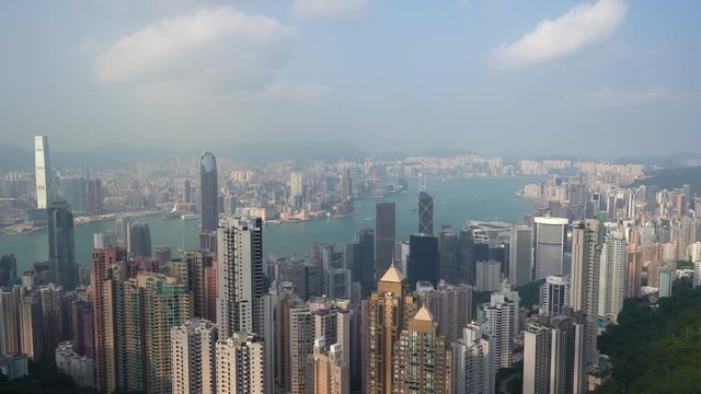 Hong Kong Amazing Panorama Overview With Skyscrapers and Downtown in Mist, Tilt Down