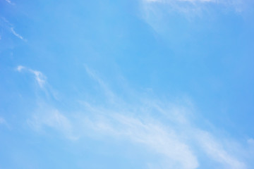 Blue sky background and soft white clouds , copy space