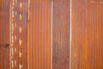 Old Zinc rust texture background, close up to pattern texture vertical zinc sheet. Abstract  Image of Rusty corrugated metal vintage background. Wall steel older dirty grunge surface fence house.