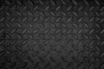 Industrial old rust metal steel list with rhombus shapes or checkered plates. Non-slip metal floor stairs sheet with rust.