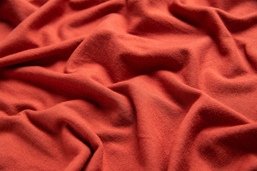 Orange-red cotton knit fabric texture material